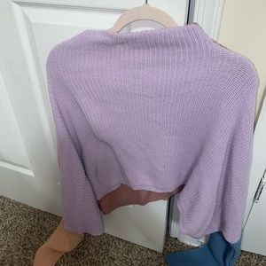 Off the shoulder cropped shirt.